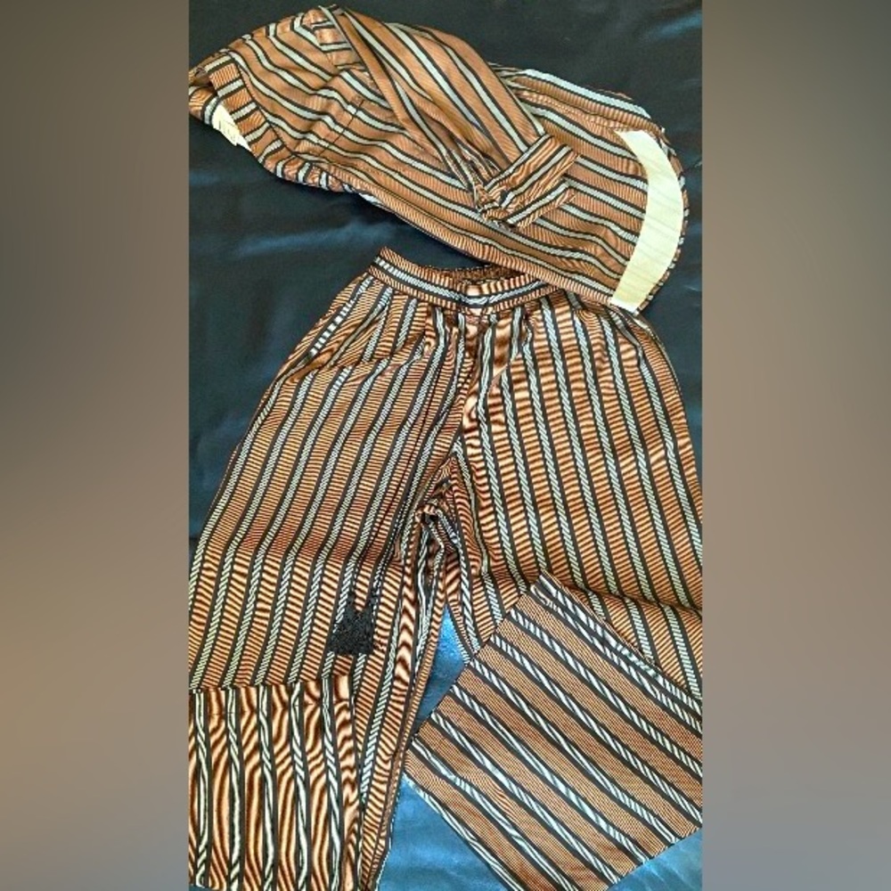 Pinstriped wide legged trouser with tassel draw string and long sleeve v-neck